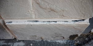 Inward shifting wall